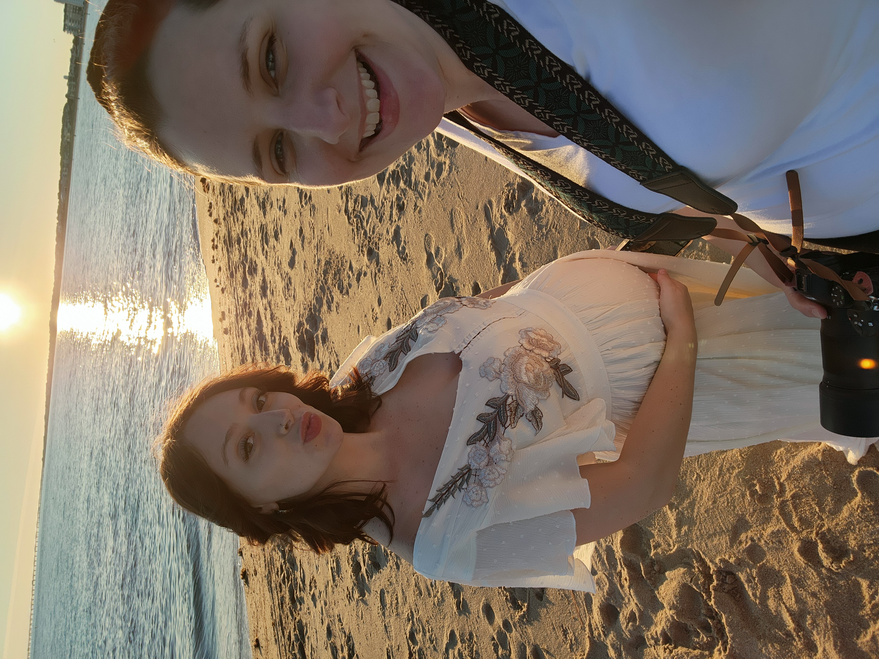 A selfie of Justine, the photographer at Justine Renee Photography and one of her maternity clients.