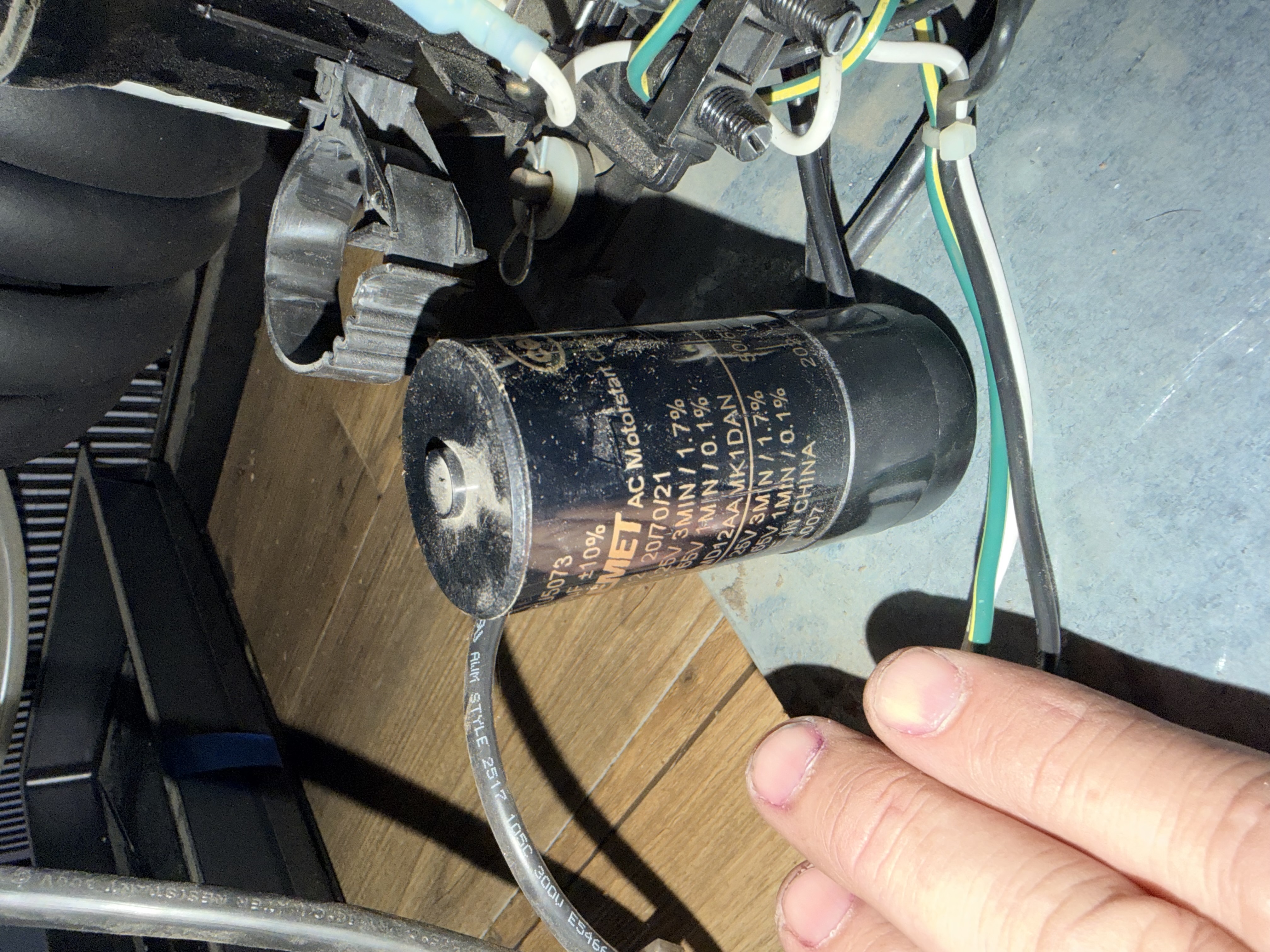 AC motor start capacitor inspected inside True commercial refrigerator — ruling out capacitor failure before compressor diagnosis, Tupelo MS