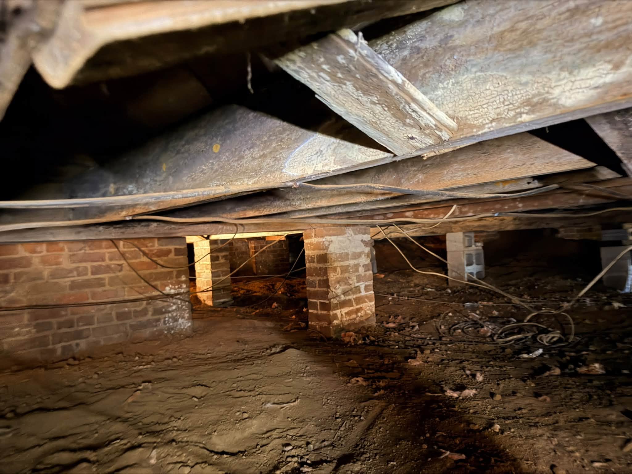 Old uninsulated sheet metal ductwork in crawlspace — Pontotoc MS HVAC replacement by S.I. Service Group