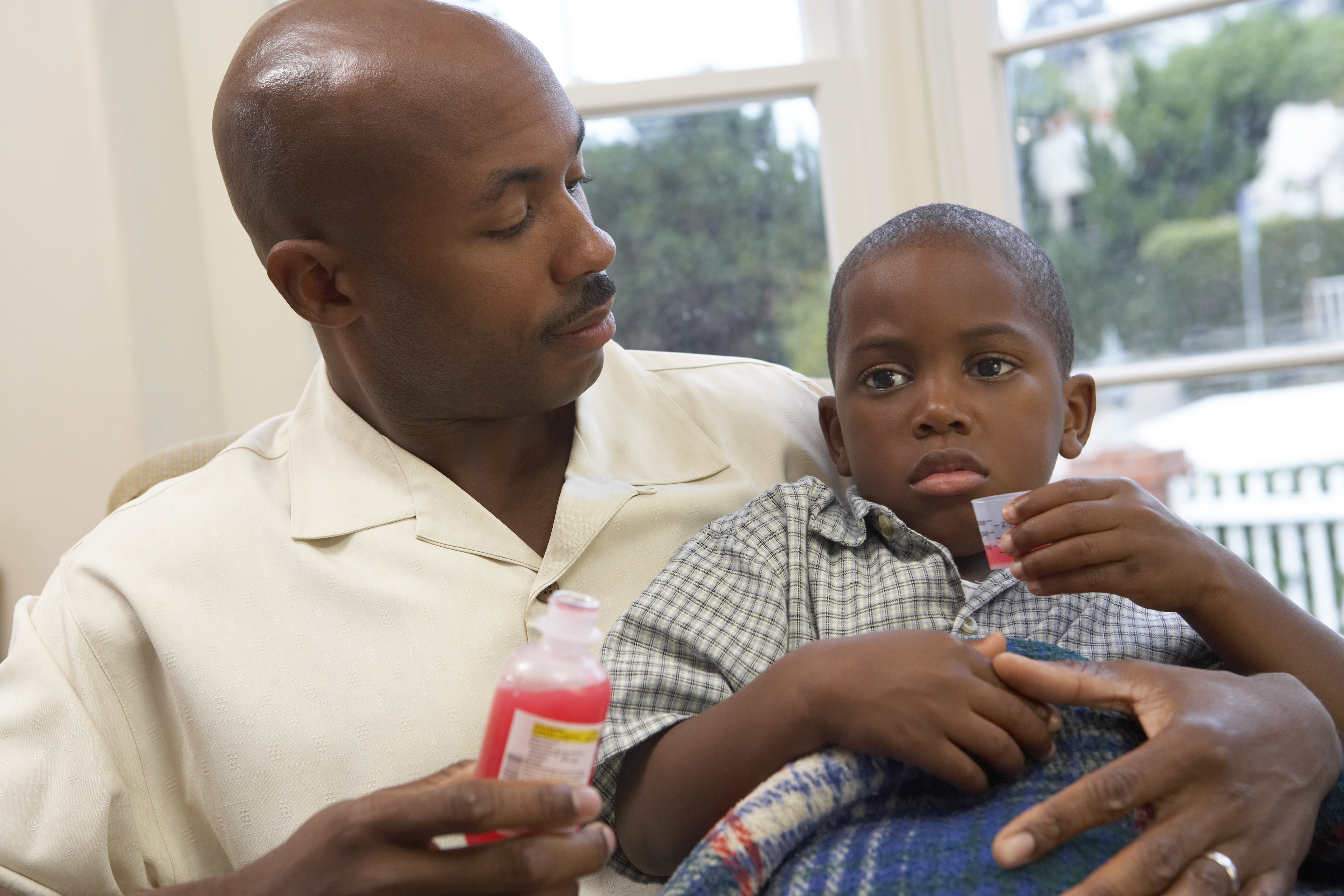 Father caring for son Photo by <a href="/photographer/bananastock-83746">BananaStock</a> on <a href="/">Freeimages.com</a>