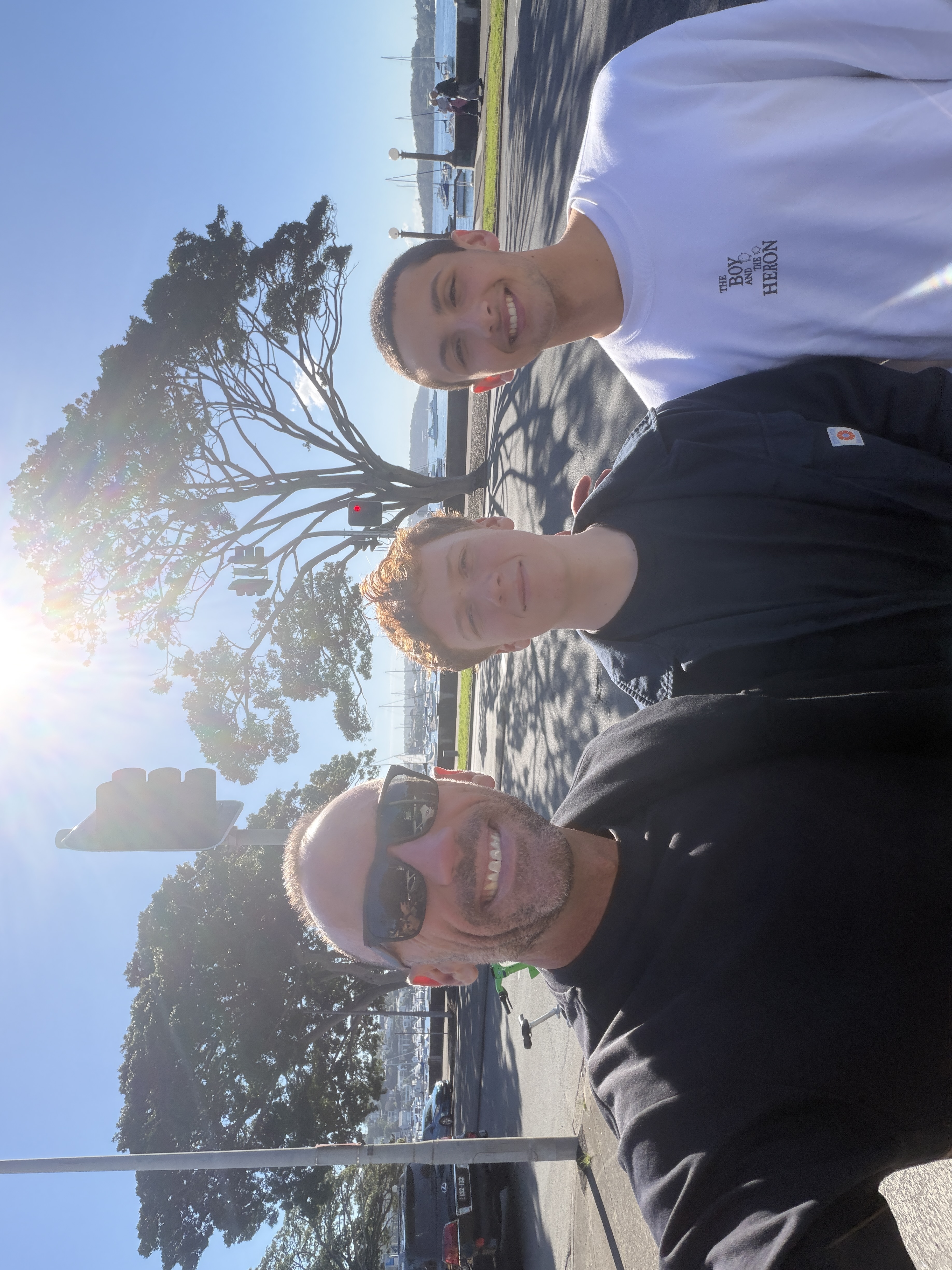 Ryan spending time with other men by the harbour
