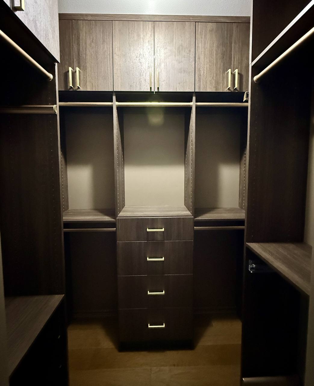 Custom walk-in closet shelving by Up Closets of Pinellas