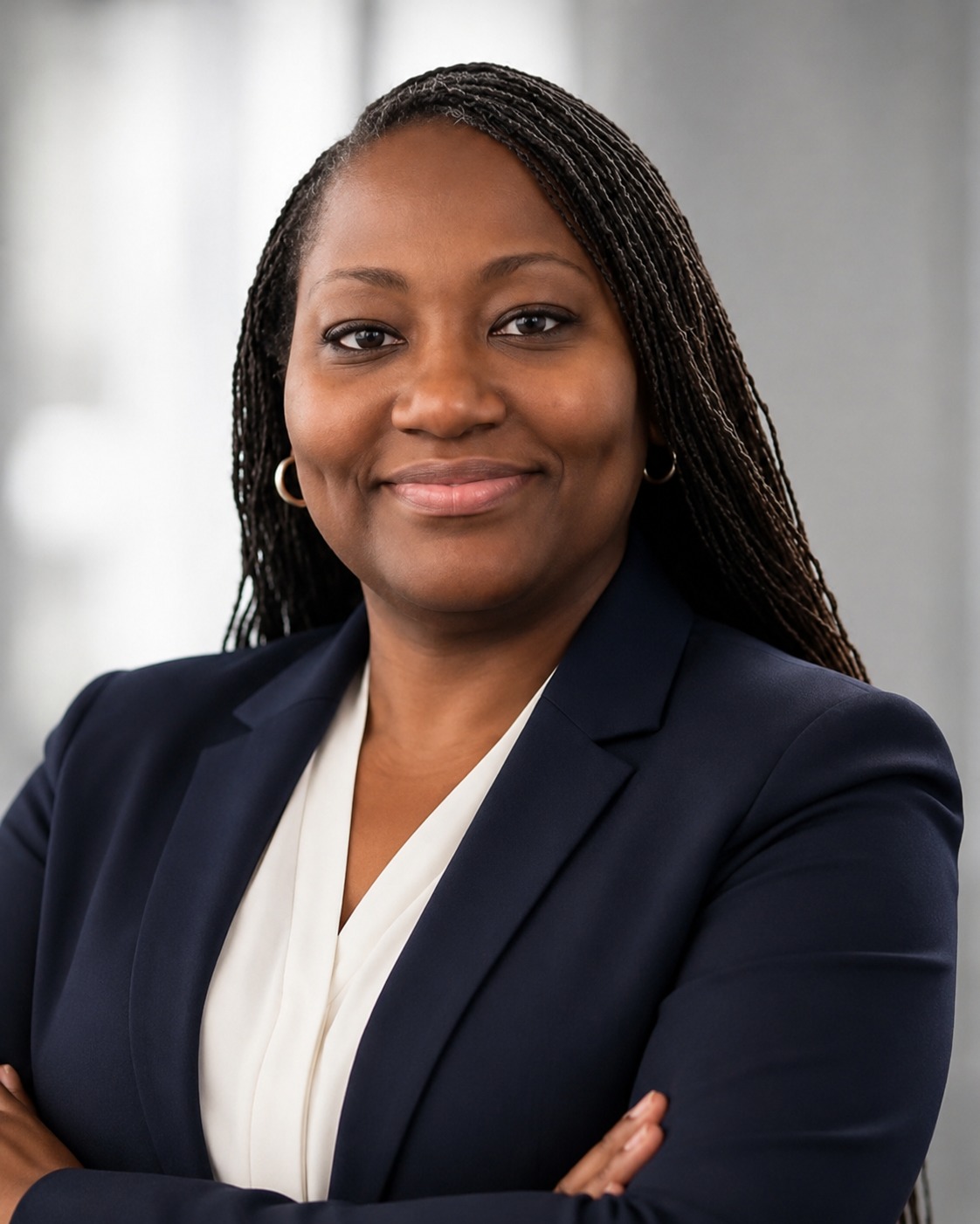 Kristi Davis, The AI Freedom Architect, smiling with arms crossed