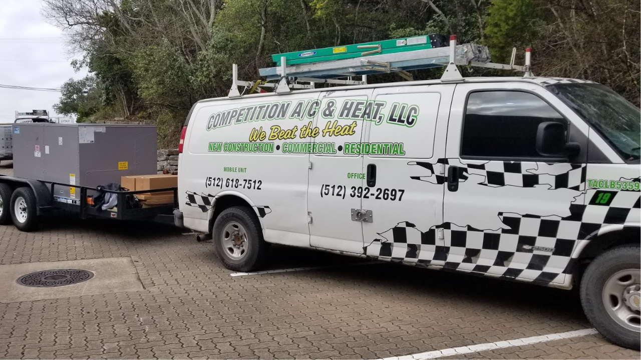 Competition A/C servicing a commercial HVAC system