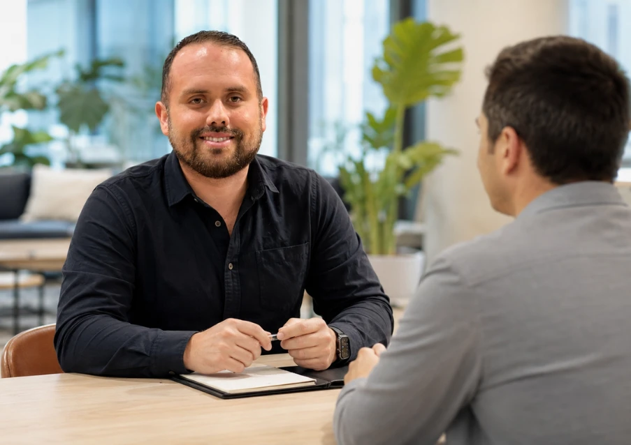 BrightPoint tax advisor consulting with a client in a modern office, emphasizing transparency and trust