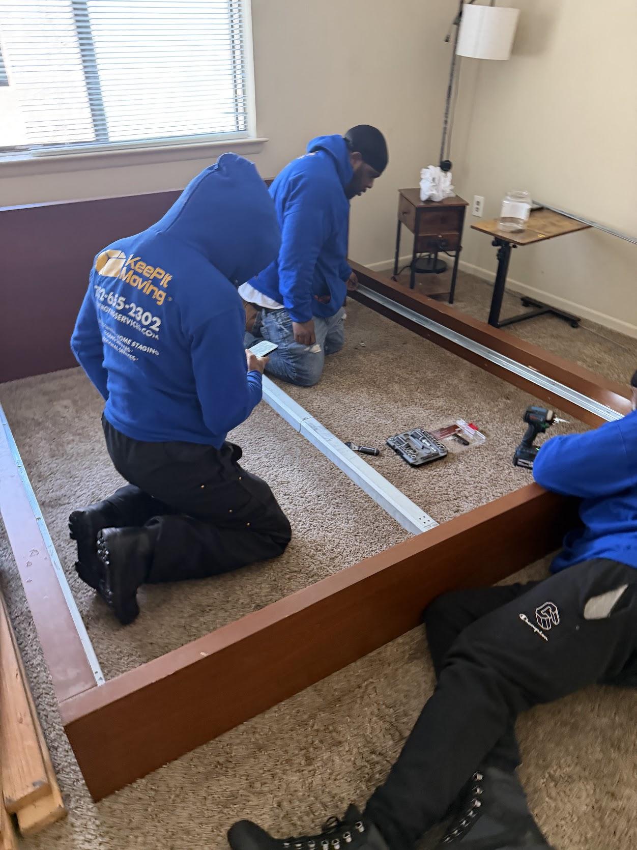 Keep It Moving Services crew handling furniture assembly during a labor-only job
