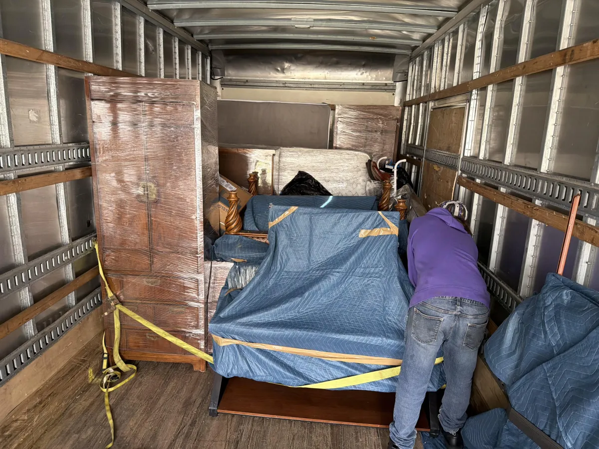 Keep It Moving Services crew loading a box truck for a Burlington County local move