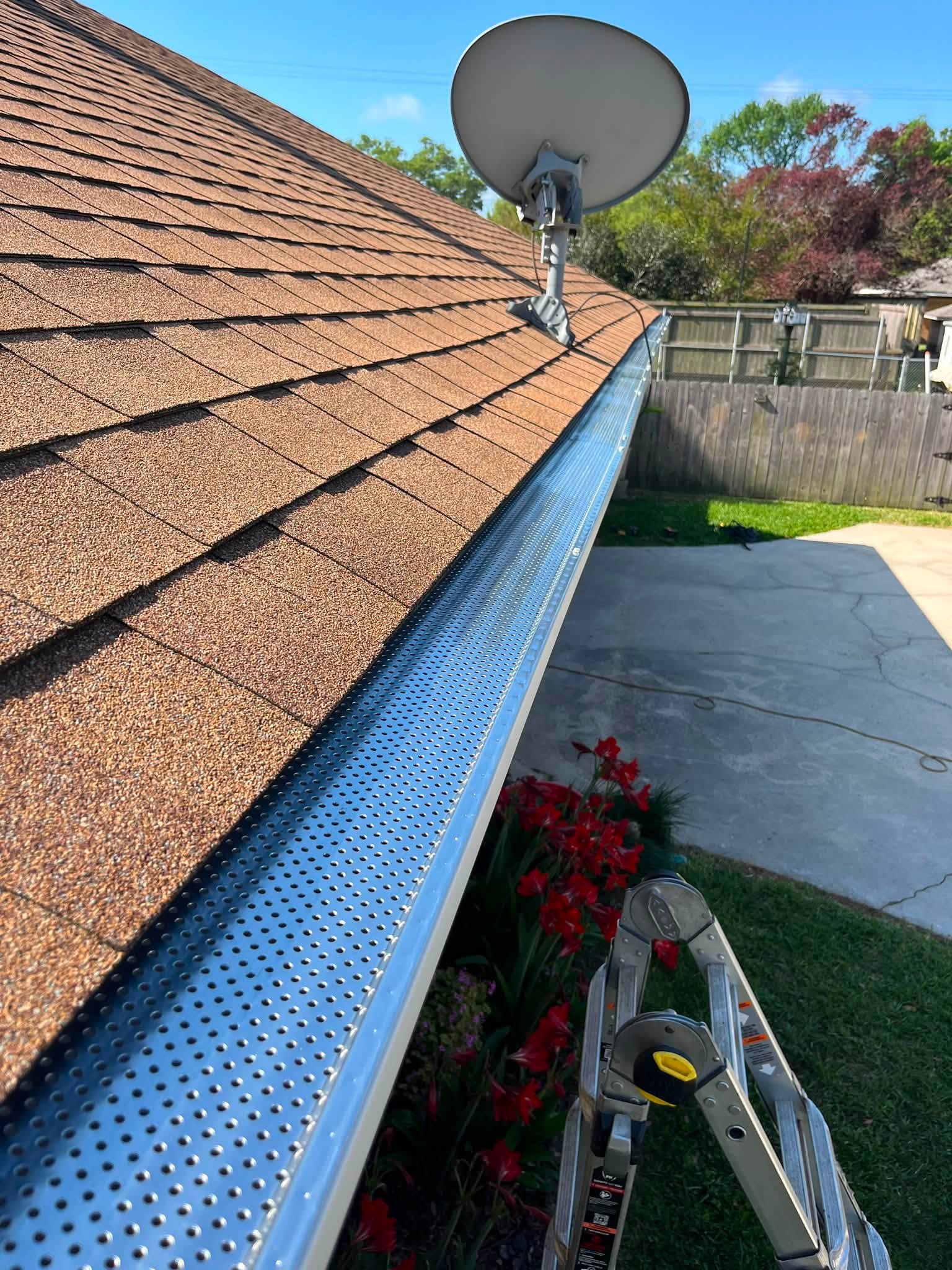 Gutter guard installation on a Houston home by Coreshield Home Systems