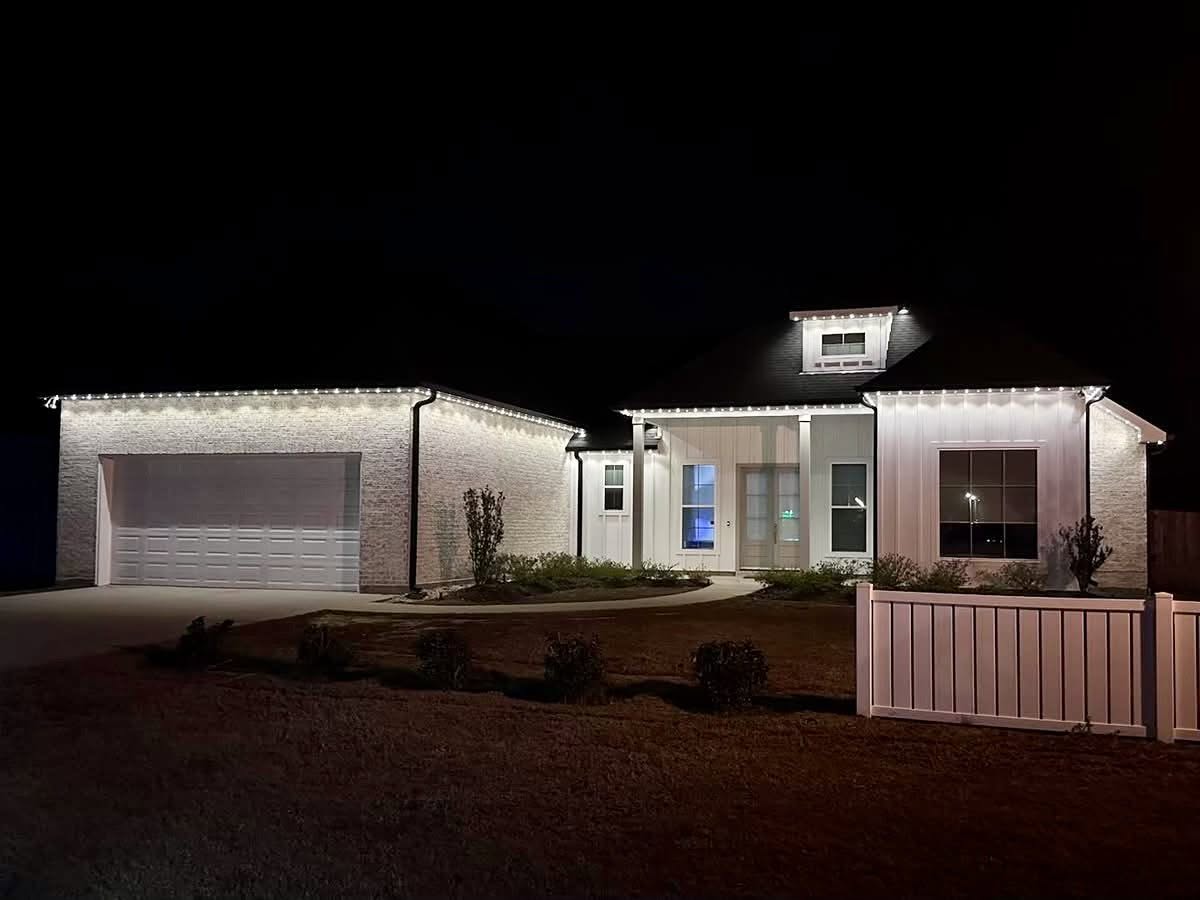 Permanent exterior lighting installation on a Houston home