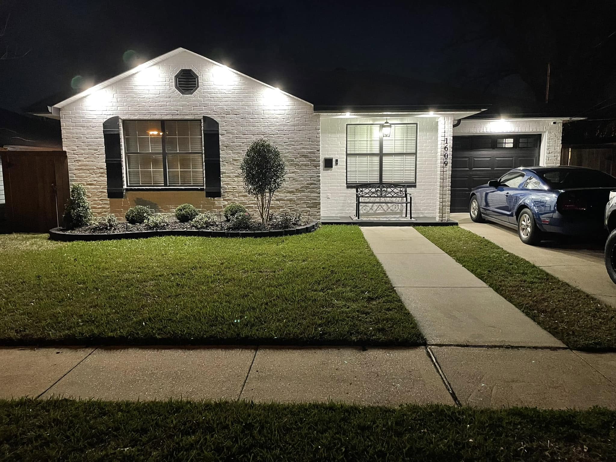 Permanent exterior lighting installed on a Houston home by Coreshield Home Systems