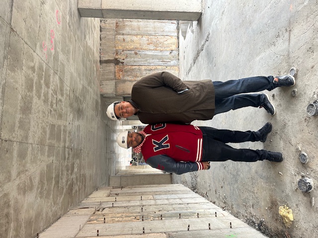 Harlem real estate developers Maurice Russell Grey and Aden Seraile on-site at a new ESRA Realty construction project. Highlighting the 3rd generation's commitment to building generational wealth and community infrastructure in New York City.