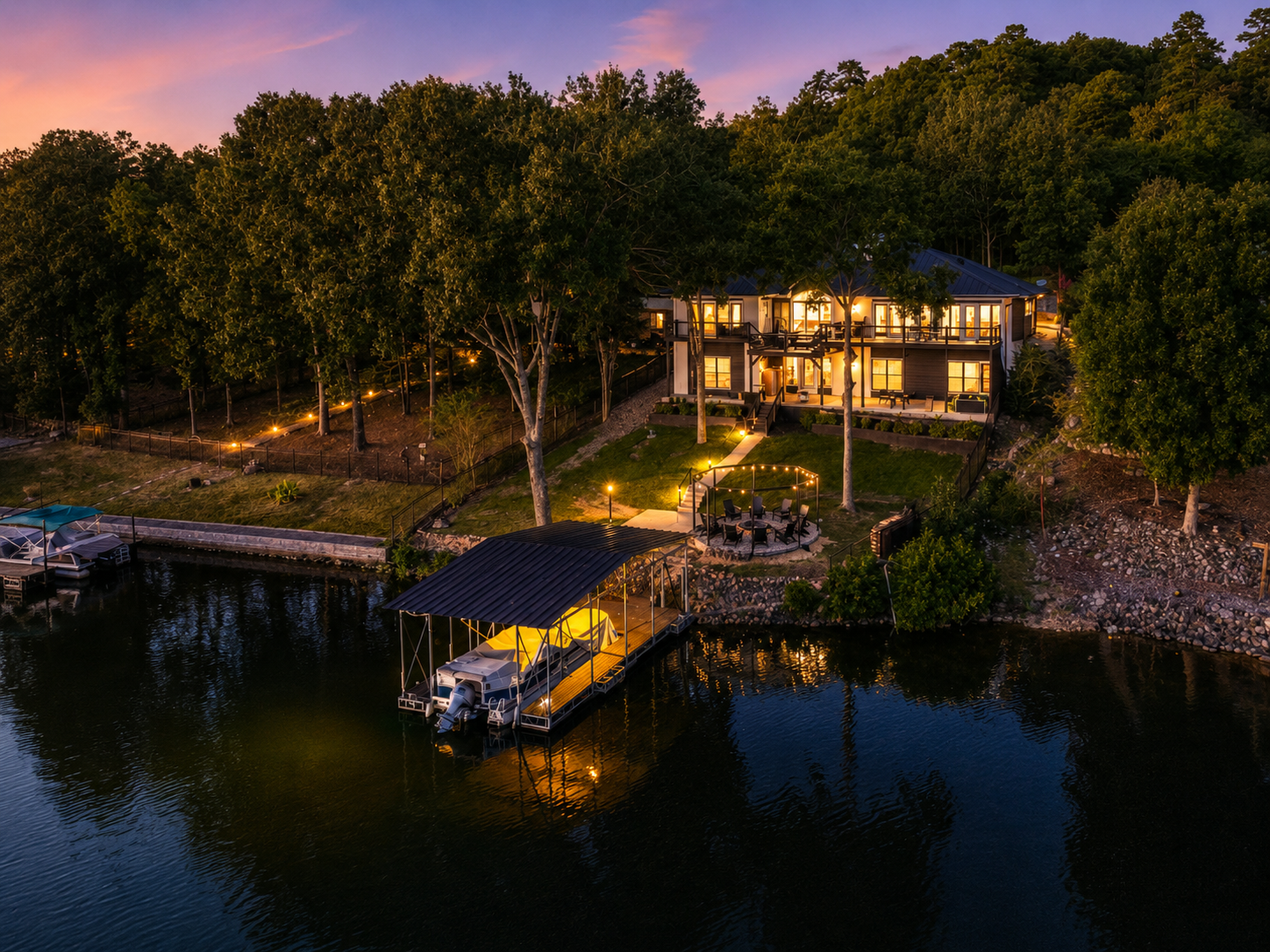 Eagle Point Hideaway lakefront home at night