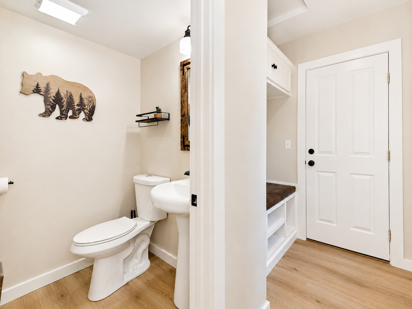 Bright half bath with hallway access at Bear Summit Hideaway