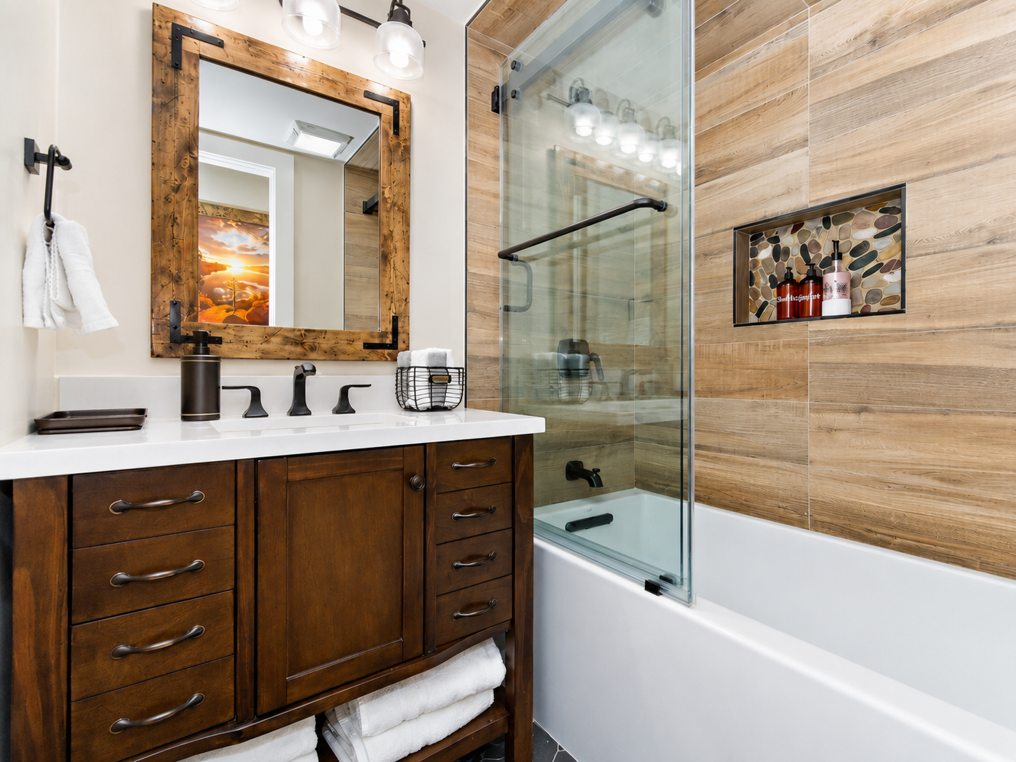 Bathroom vanity with bathtub and shower at Bear Summit Hideaway