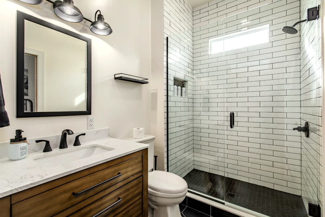 Bathroom vanity and walk-in shower at Bourbon Trail Hideaway