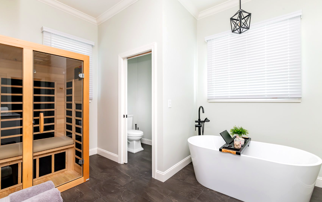 Bathroom with bathtub and sauna at Bourbon Trail Hideaway