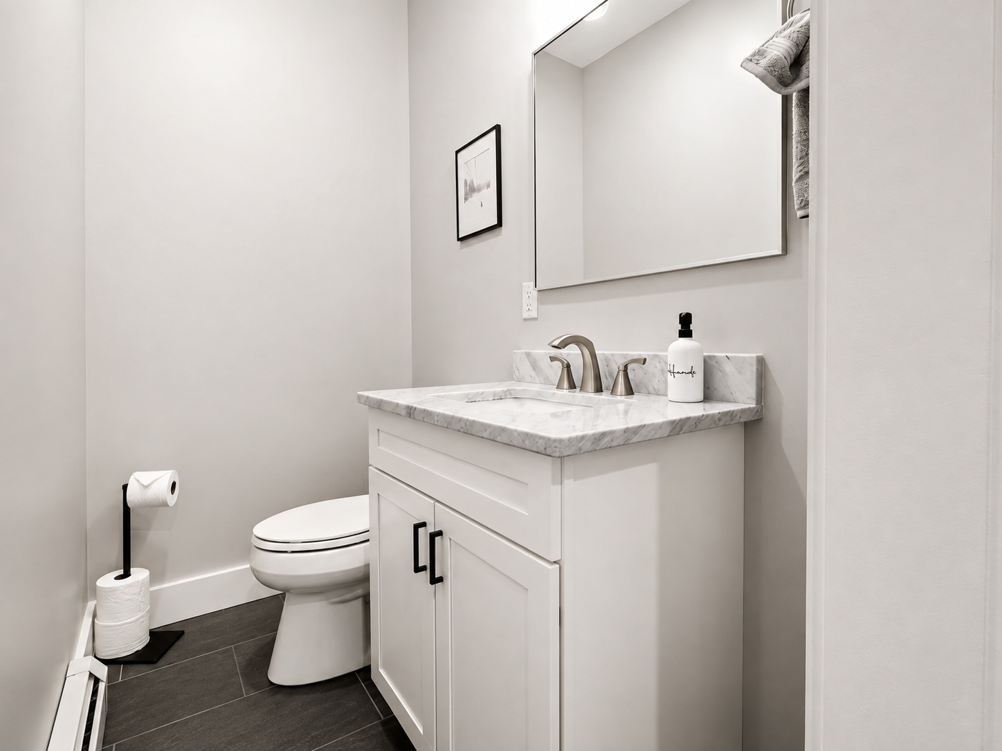 Powder bathroom with vanity and mirror at Sunday Summit Hideaway