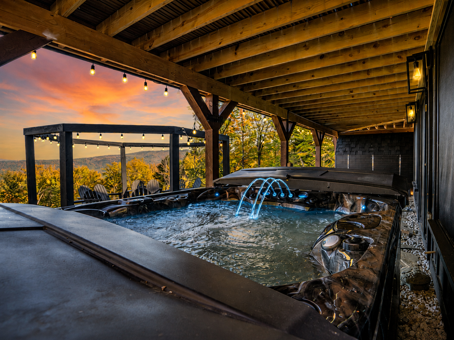 Sunday Summit Hideaway covered hot tub with mountain views