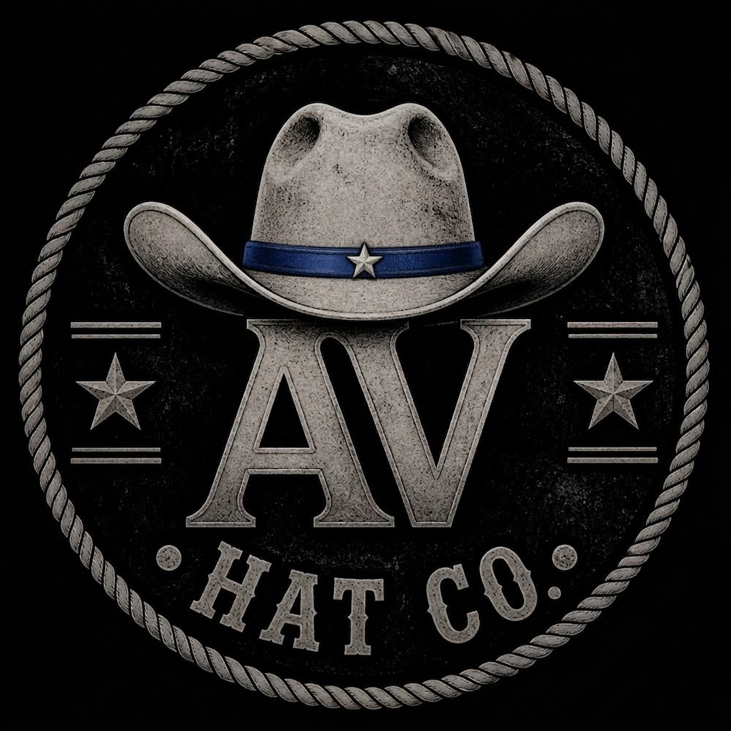 American Vaquero Hat Co. badge logo — cowboy hat with thin blue line band, AV monogram, rope border