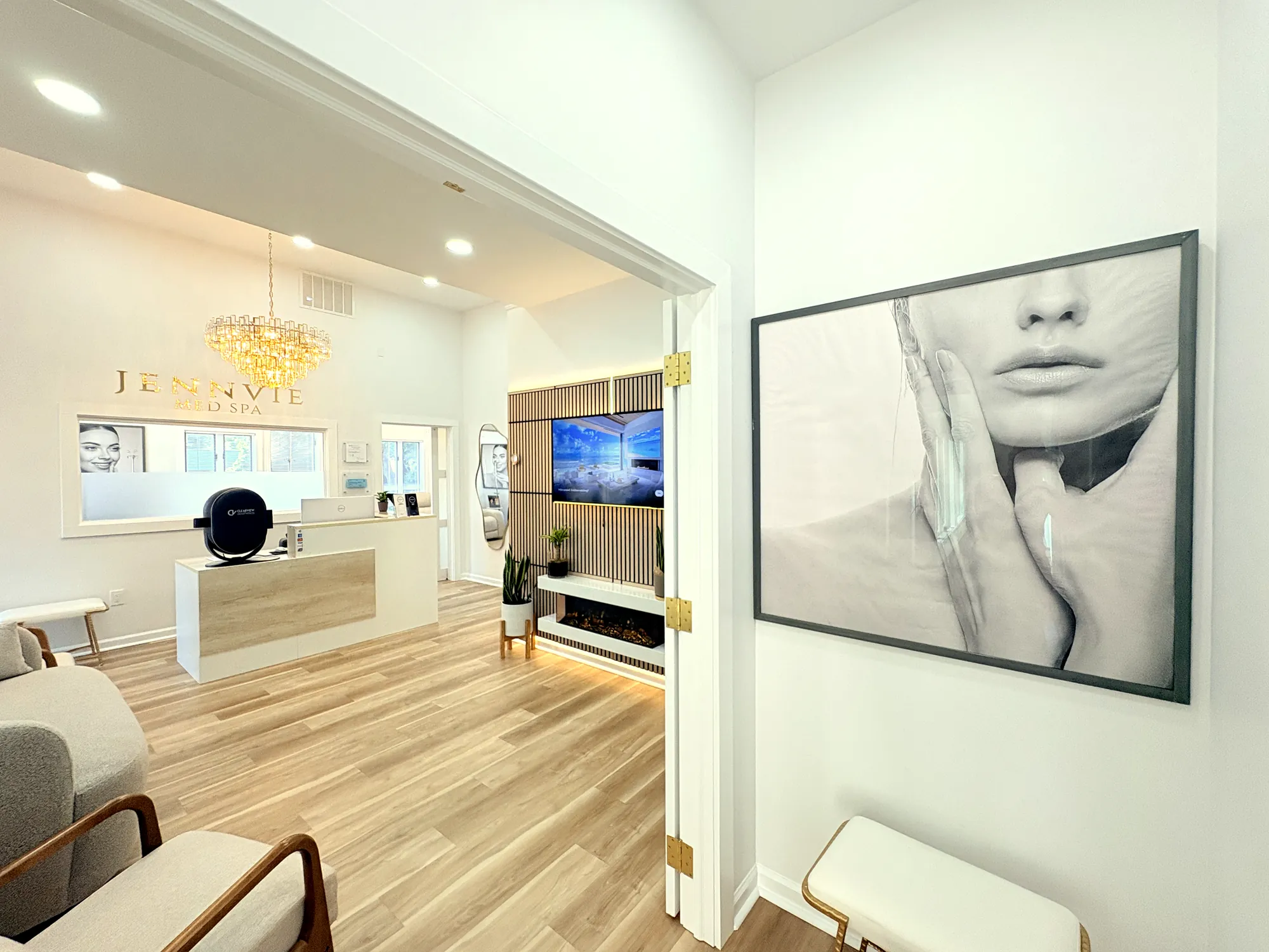 View through the doorway to reception at JENNVIE Med Spa in Westport, CT