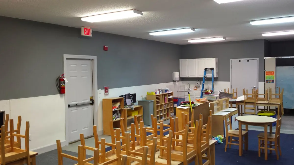 Commercial classroom space painted in gray and white