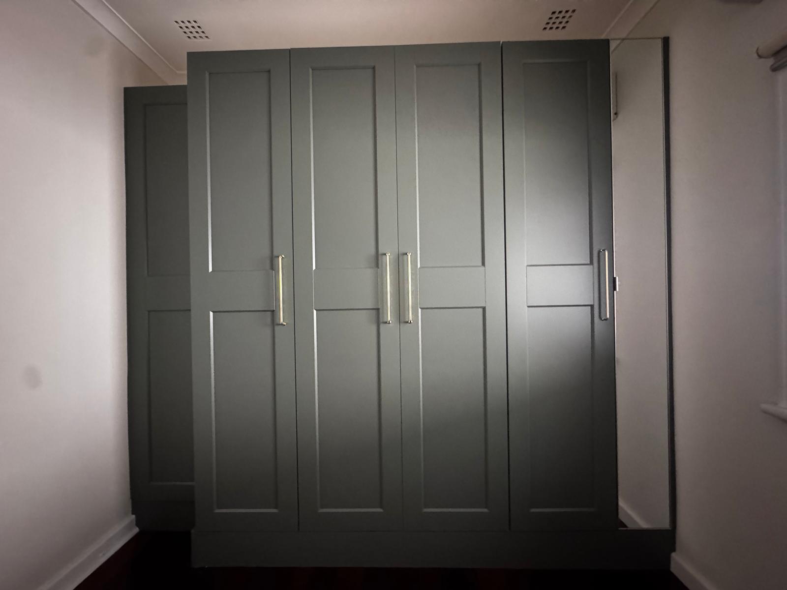 Built-in look dark wardrobe installation in Perth