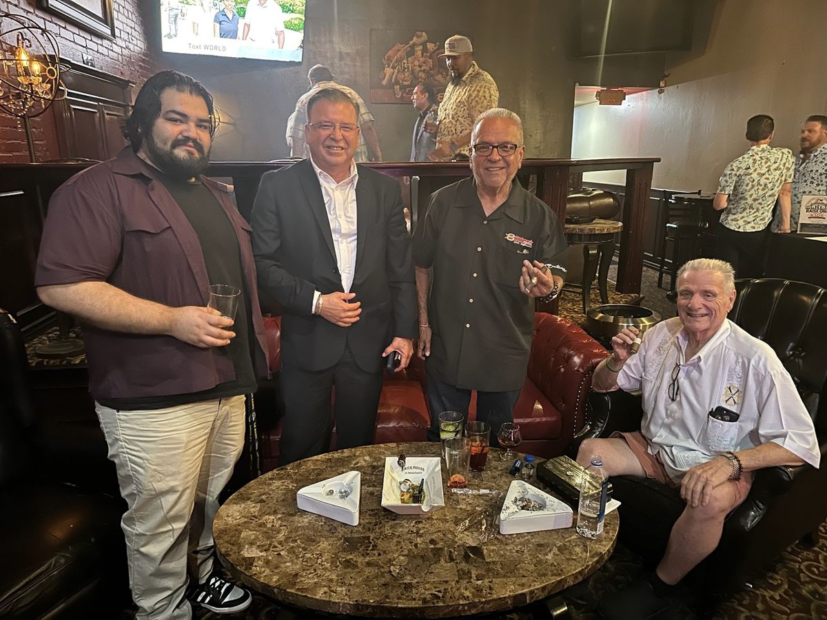 Guests raising a glass for local kids