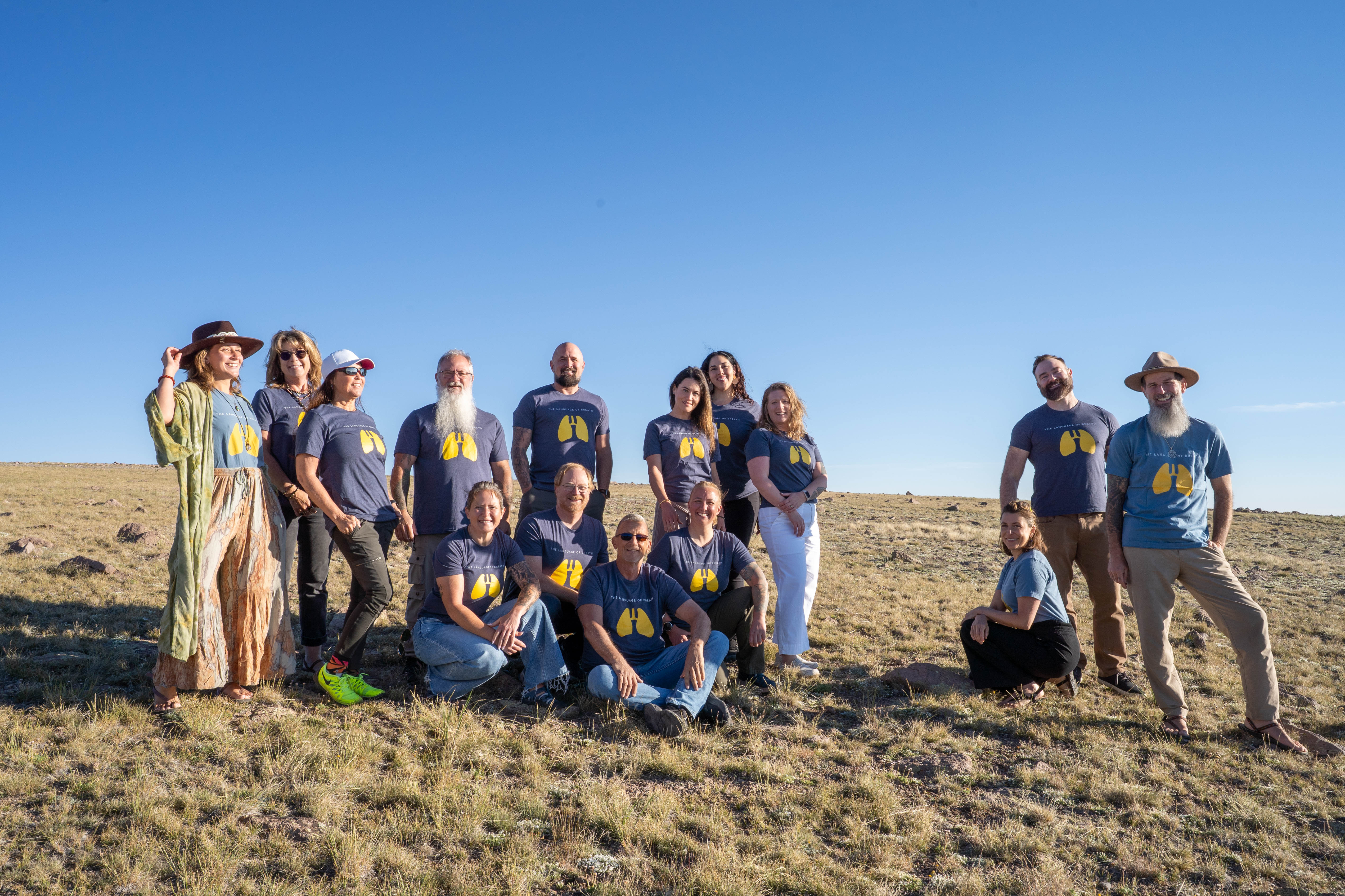 Certified Language of Breath breathworkers together on a ridge in Utah