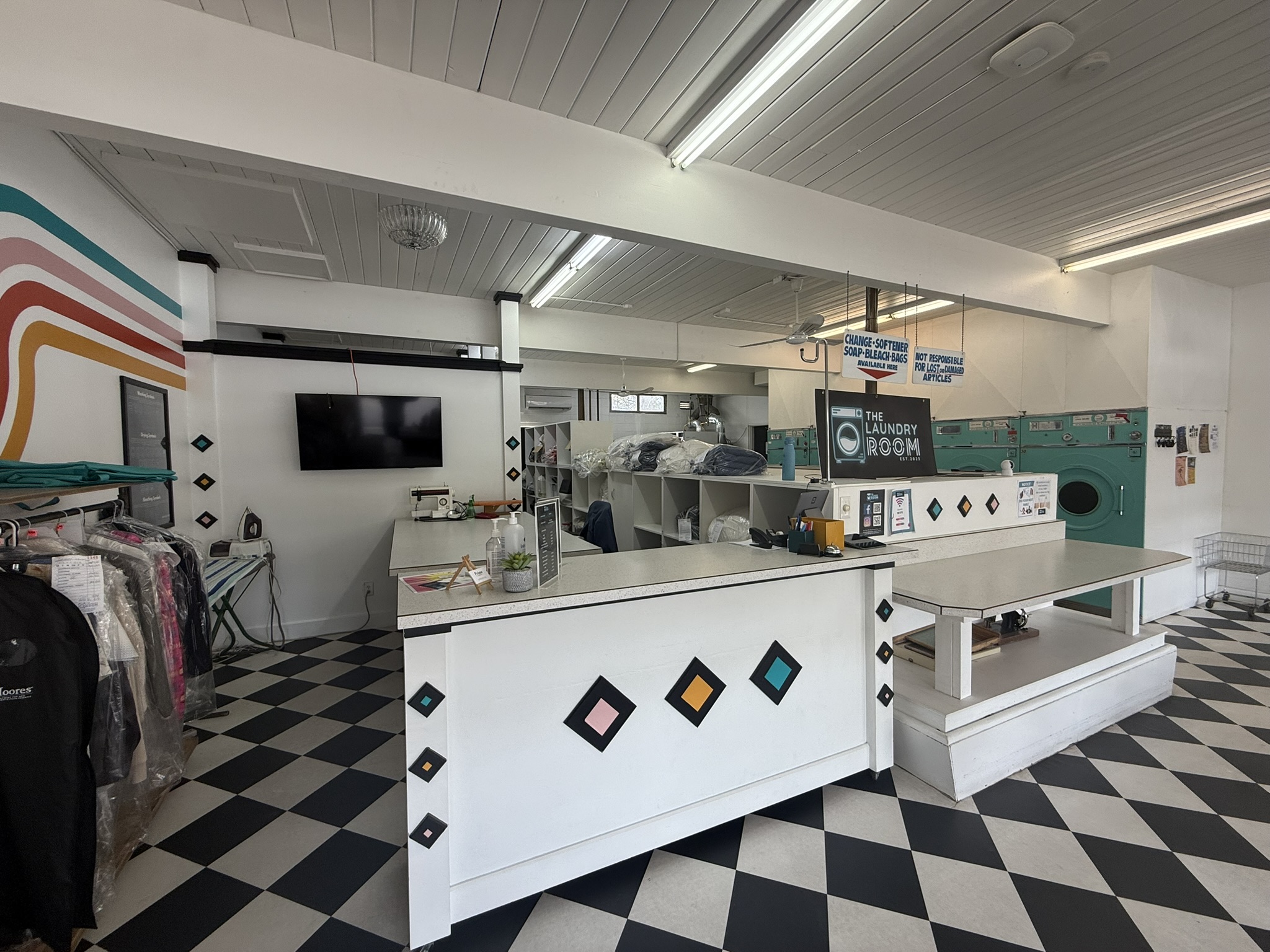 The Laundry Room interior counter and dryers