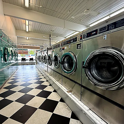 Commercial laundry machines at The Laundry Room