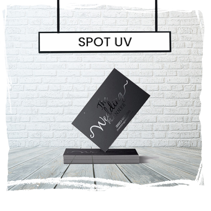 Spot UV coating on business cards and print pieces for premium tactile finish