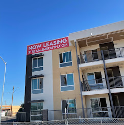 Streamliner 65th Now Leasing large outdoor building banner