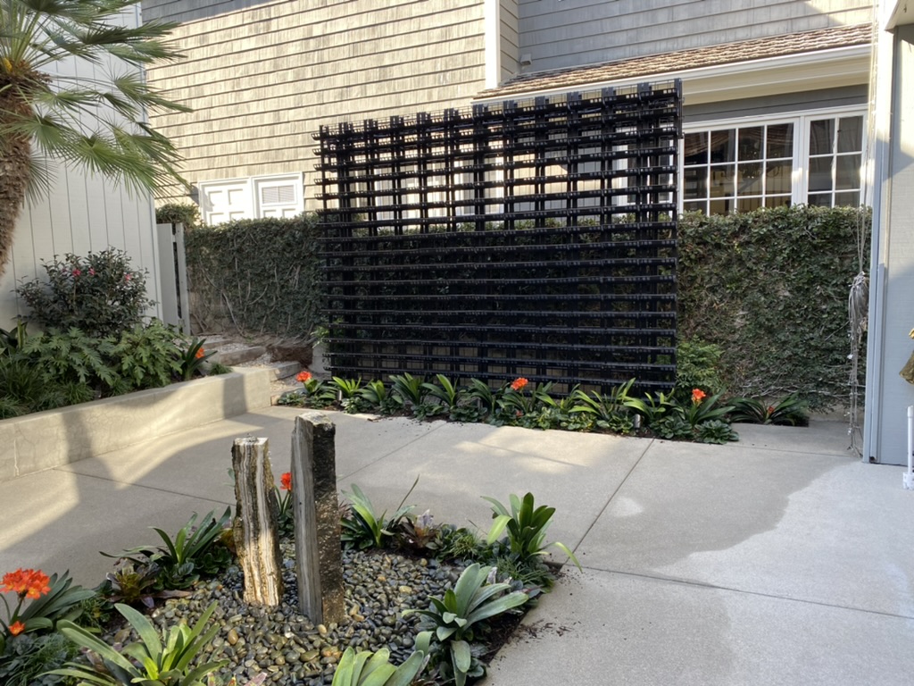Custom steel privacy screen structure under construction in Newport Beach