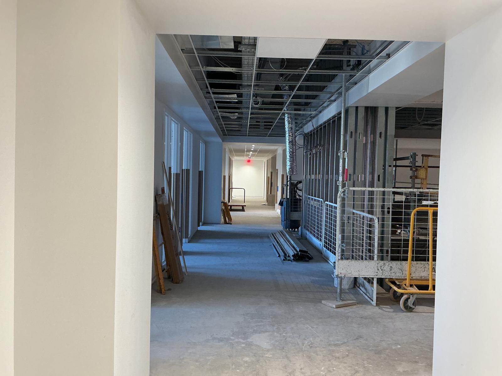 Newly painted white hallway in a commercial building