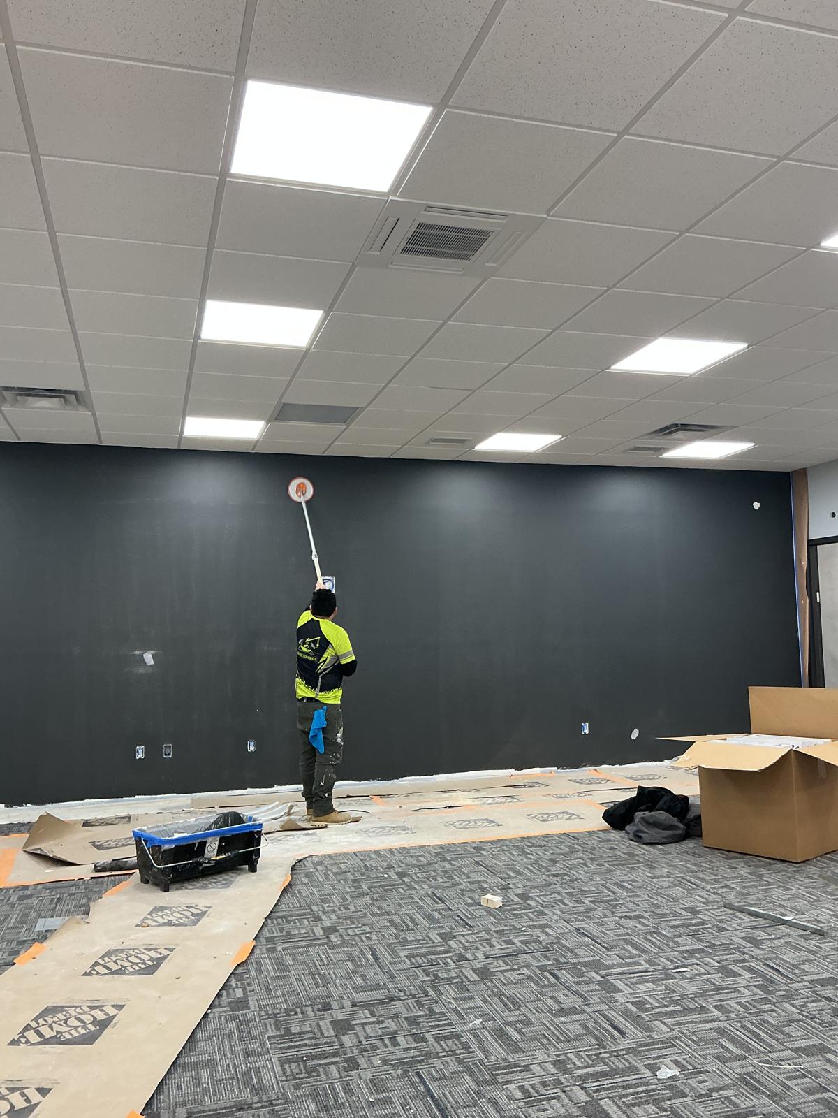 Newly painted white hallway in a commercial building