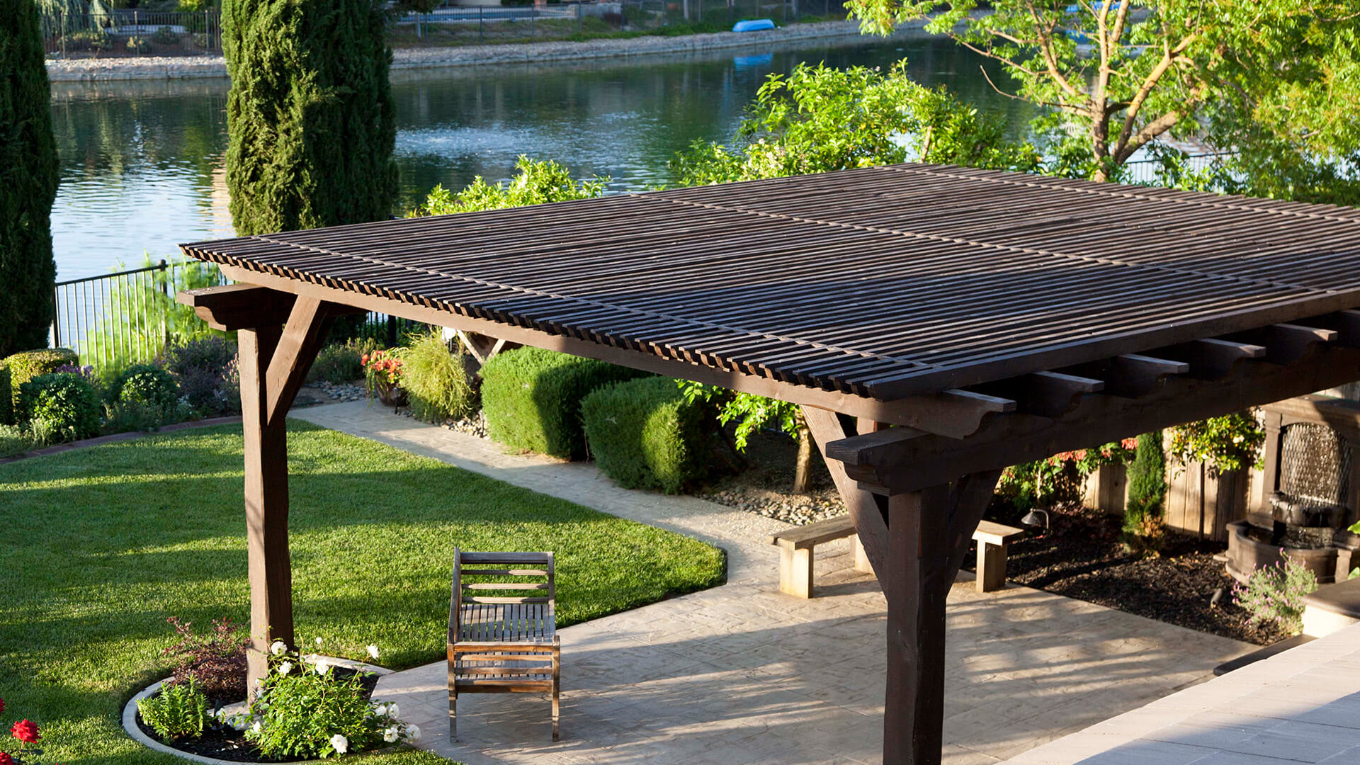 Penryn patio cover and covered outdoor living space by Lavish Gardens Landscape