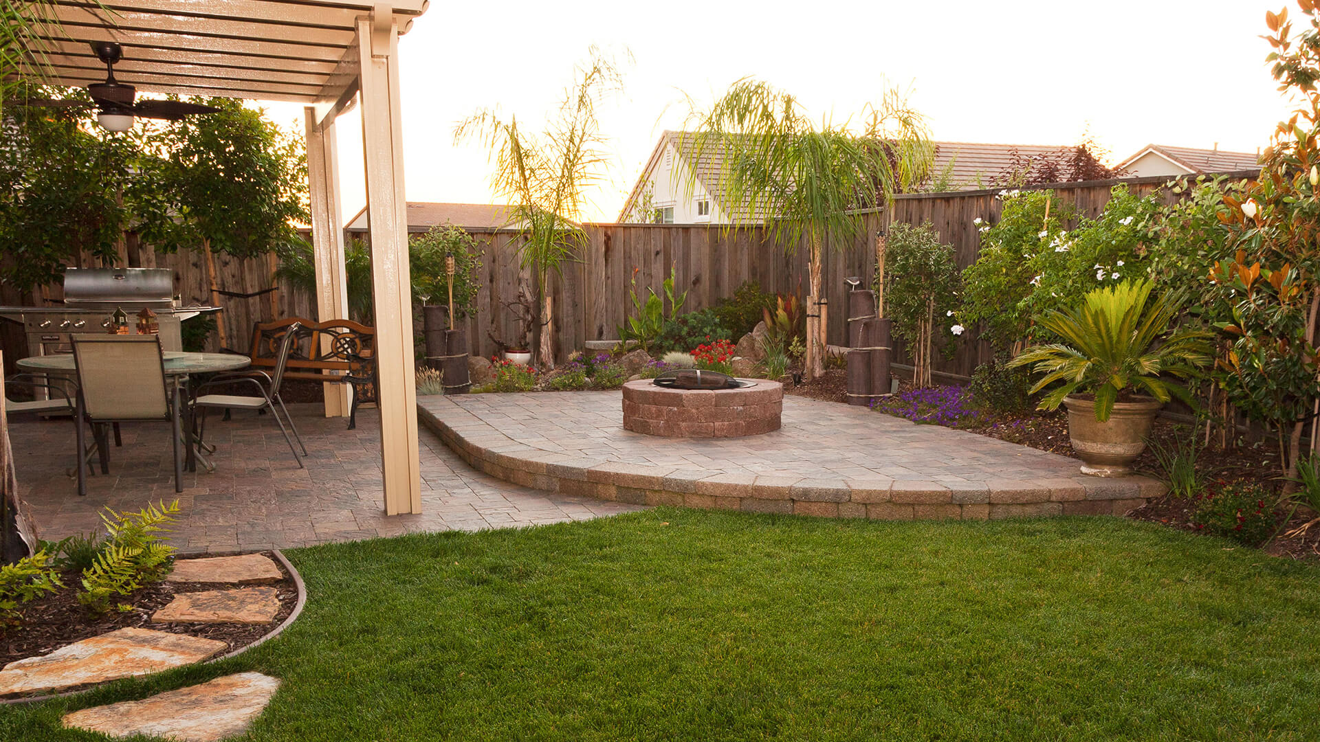 Folsom fireplace and fire pit outdoor living project by Lavish Gardens Landscape