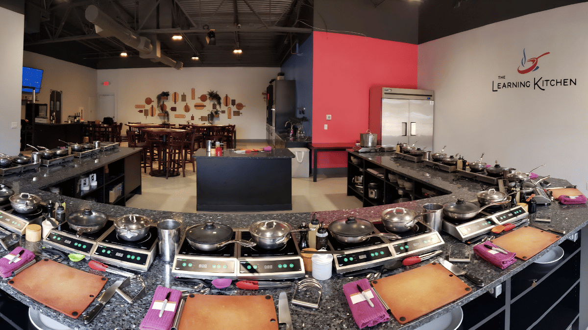 Wide-angle classroom view of hands-on cooking classes in Cincinnati at The Learning Kitchen Wide-angle classroom view of hands-on cooking classes in Cincinnati at The Learning Kitchen