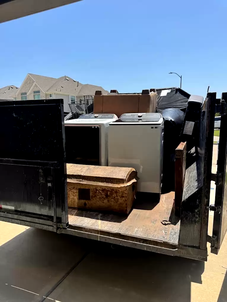 Washing machine and upholstered furniture in a trailer