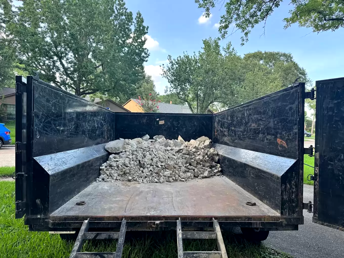 Dump trailer loaded with broken concrete