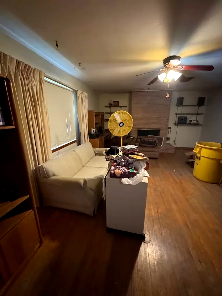 Furniture and household items awaiting a cleanout