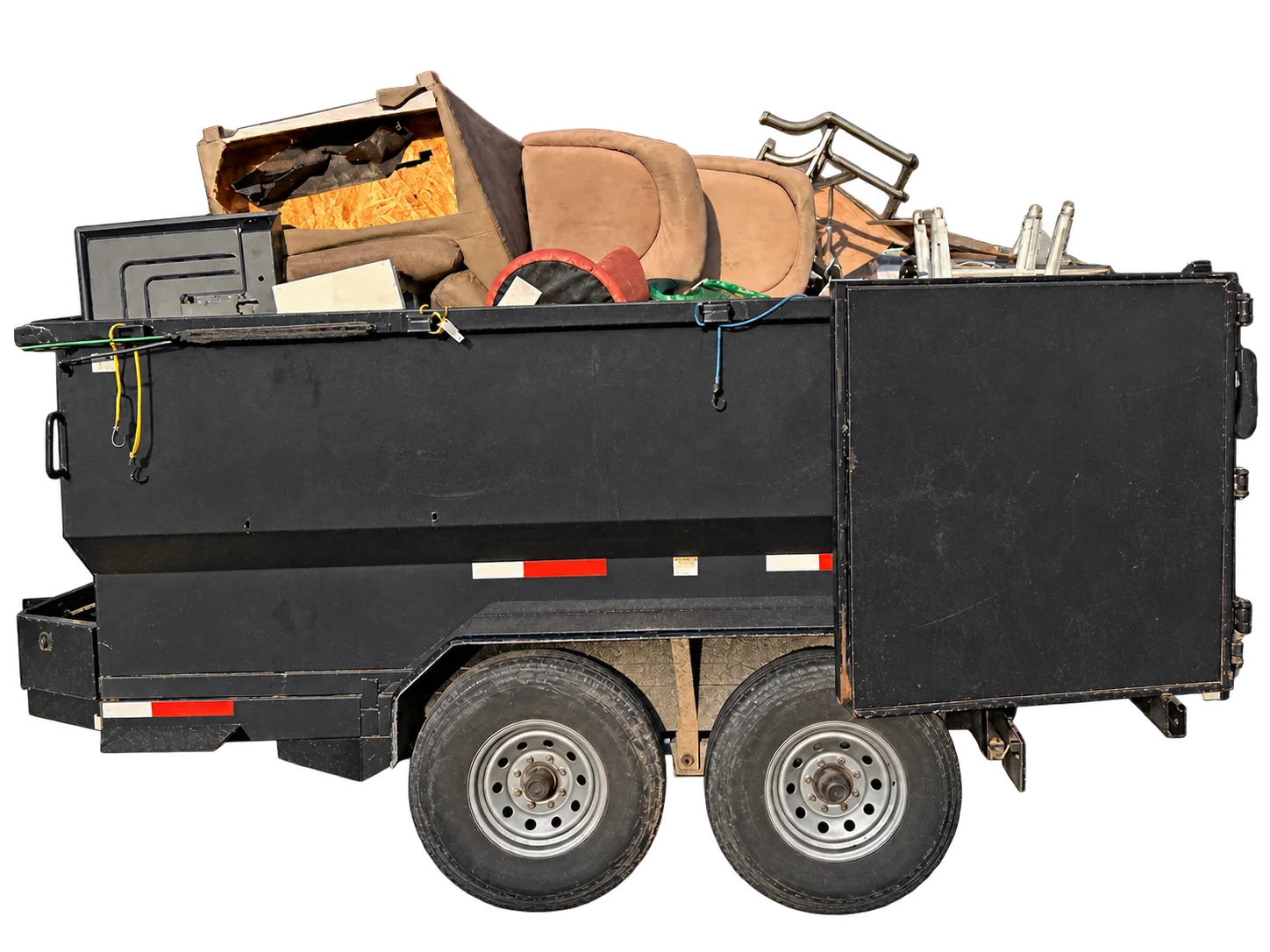 Loaded Dumpster 55 Crew trailer ready for haul-away