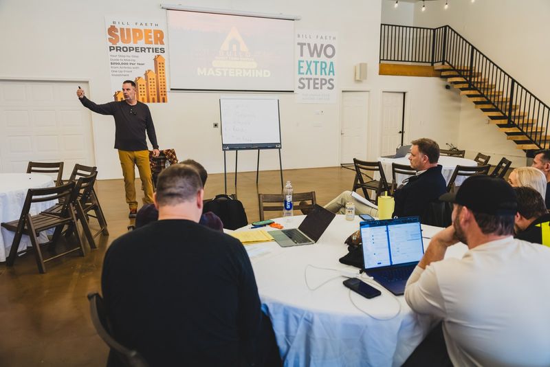 Mastermind workshop with laptops open