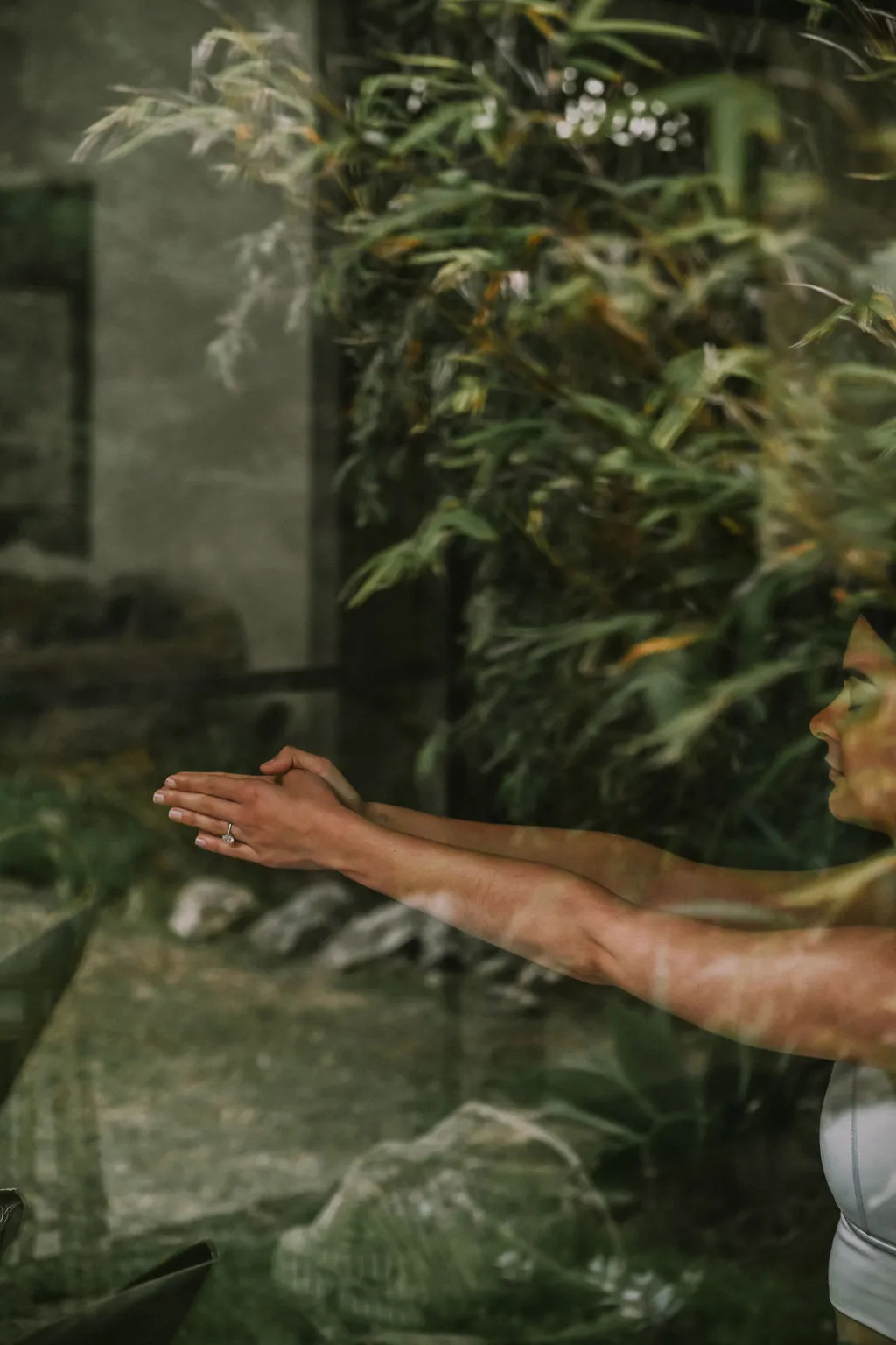 Woman practising yoga with eyes closed