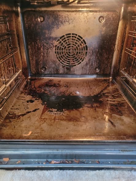 A customer's oven before cleaning