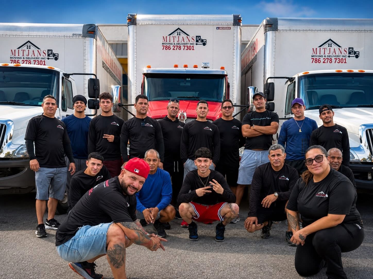 MITJANS Moving & Delivery team in front of the trucks