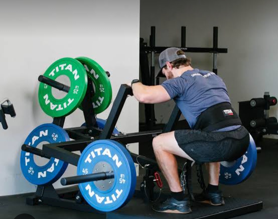 Member using the belt squat at Totally Pumped