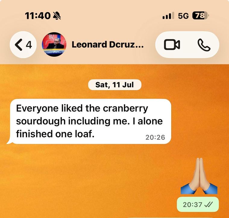 WhatsApp message from Leonard Dcruz about the cranberry sourdough