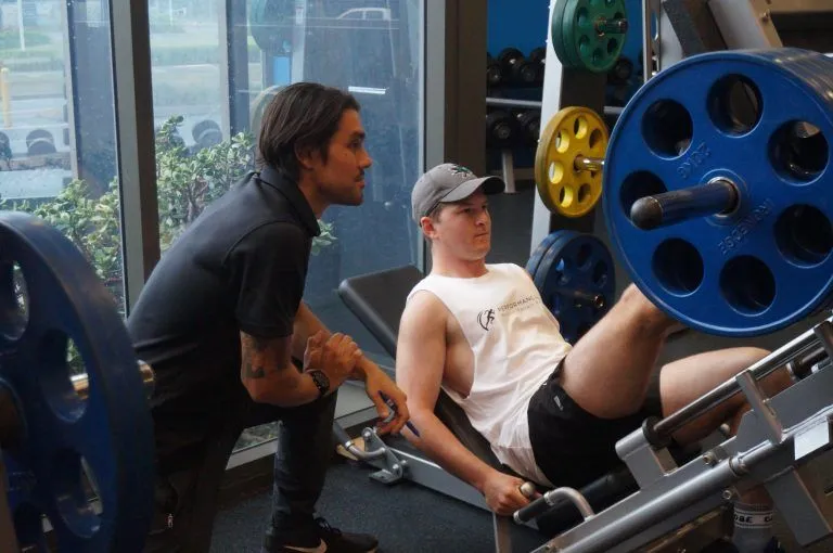 "Patient exercising for ACL recovery with knee injury treatment at physiotherapy." "Patient exercising for ACL recovery with knee injury treatment at physiotherapy."