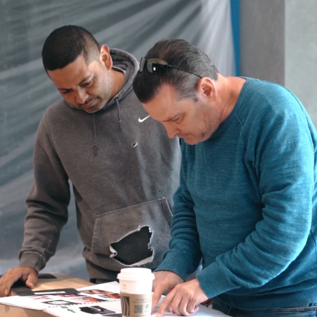 Construction coordination: Lior reviewing the drawings with the build team